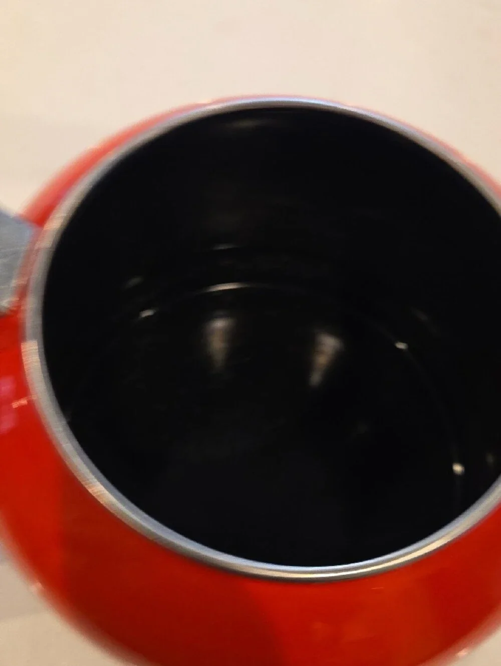Le Creuset Red Whistling Tea Kettle with Black Handle